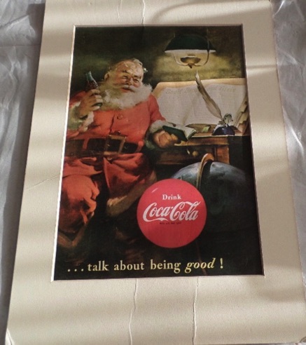 P09257-1 € 7,50 coca cola plaat 35x25 cm kerstman zittend aan bureau.jpeg